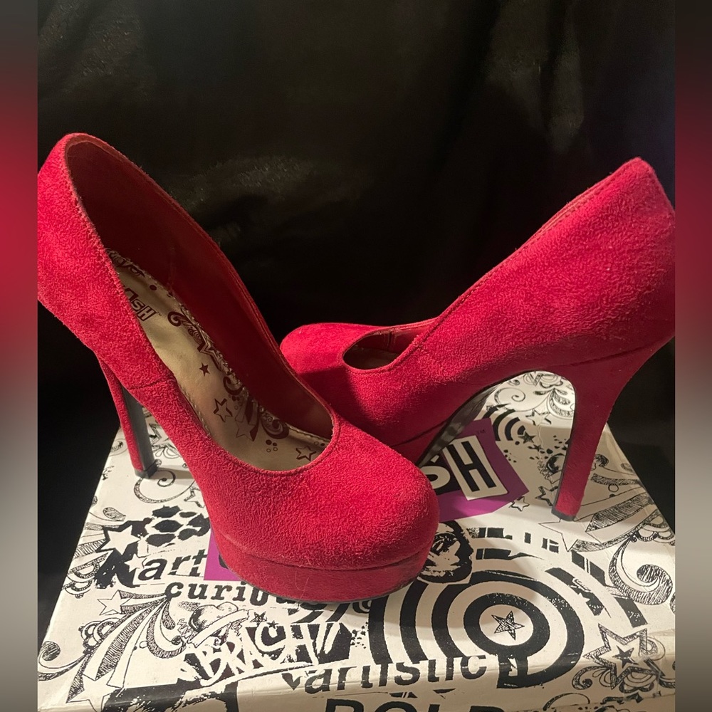Red high heel pumps
